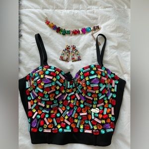 Bejeweled corset top with matching earrings and choker necklace.